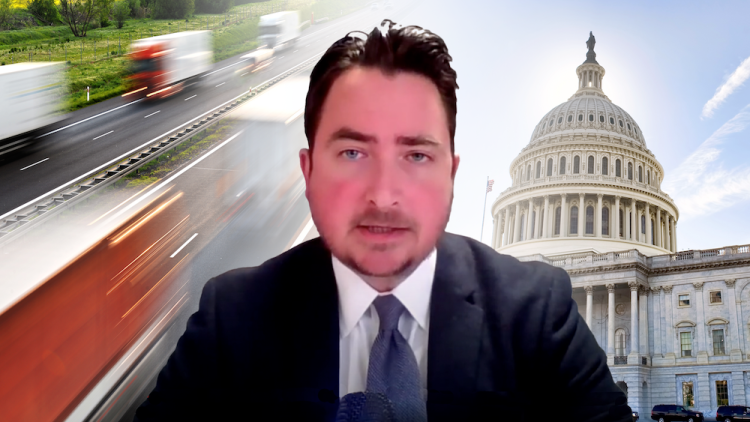 Image of David Correll agains a background with tractor trailers and the US Capitol Building