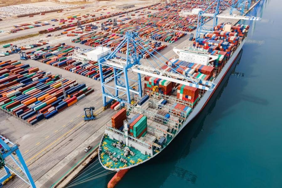 Shipping container boat at a dock