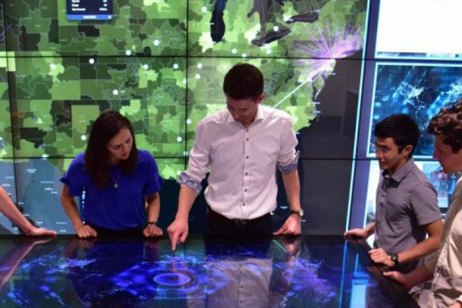 Students gathered in the CAVE Lab. 